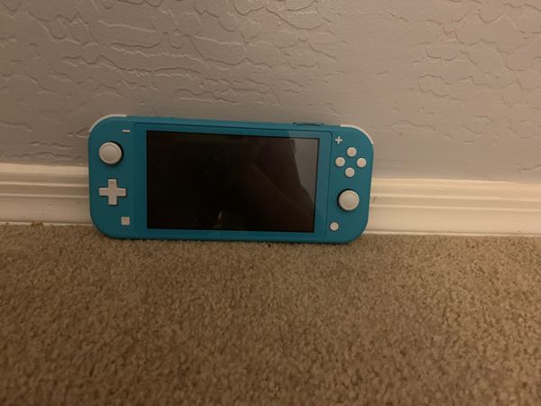 Nintendo switch lite turquoise cracked screen comes with every thing ...