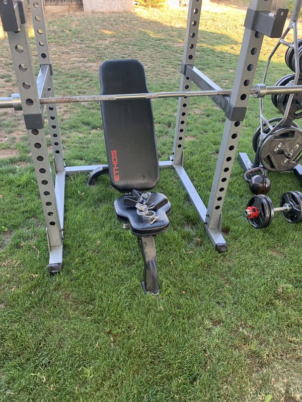 Body solid squat rack & ethos bench & 435lbs olympic weights for Sale