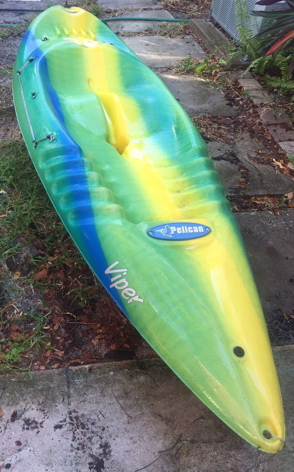 Ocean Kayak by Pelican, 9 foot length. 2 Fishing pole, Cooler, drink