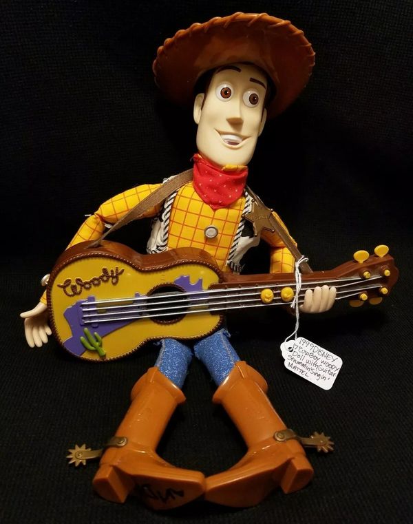 toy story 2 strummin singing woody