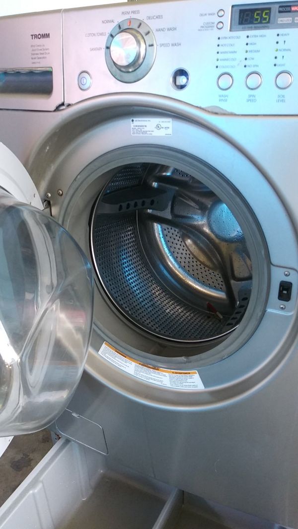 LG tromm Ultra capacity washer machine plugged in and ready for you to