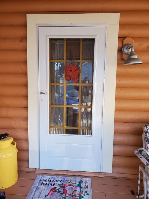 Storm door 36x 80 comes with 2 full screens and removable glass for