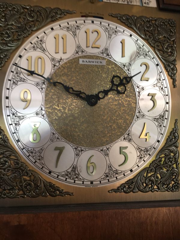 howard miller grandfather clock serial number location