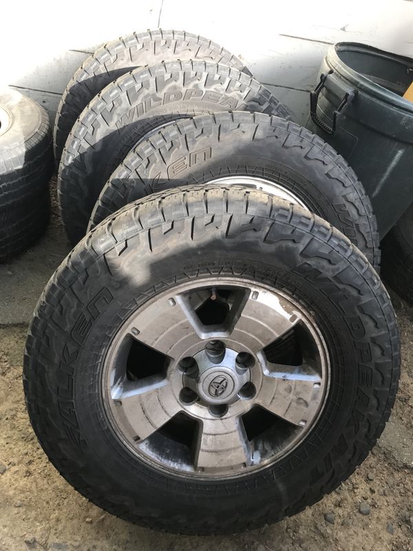 Falken Wildpeak A/T 265/70r17 All Terrain 32 inch Tires with wheels for Sale in San Jose, CA