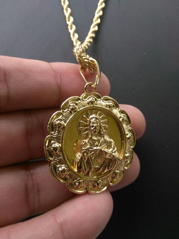 14k Gold filled Rope chain with Virgin Mary/Jesus Medallion for Sale in ...