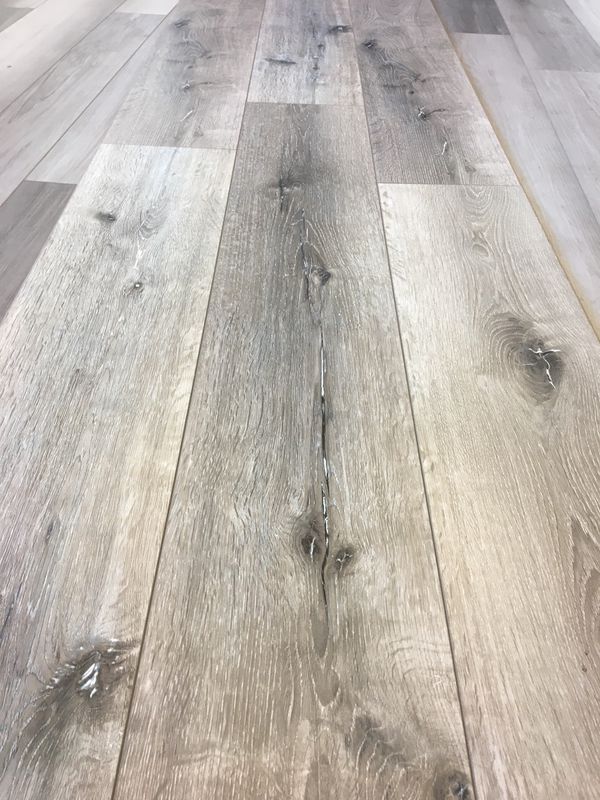 Rustic grey Laminate Flooring with pad attached for Sale in Vancouver