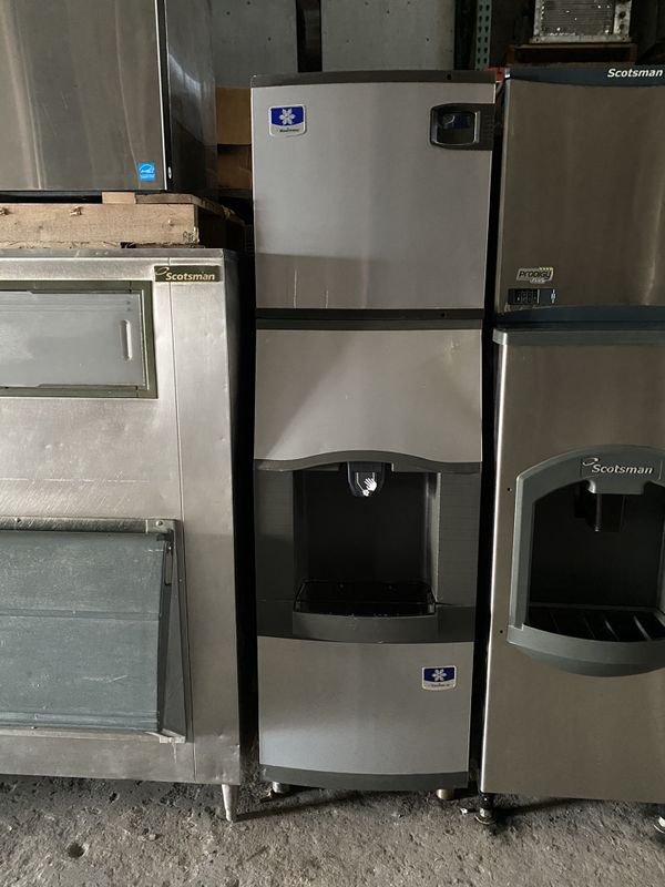 MANITOWOC 300 POUND ICE MACHINE WITH A HOTEL ICE DISPENSER for Sale in