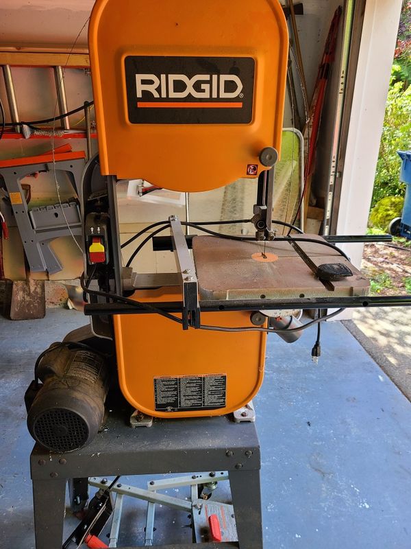 Ridged band saw on rolling stand with 2 extra blades for Sale in ...