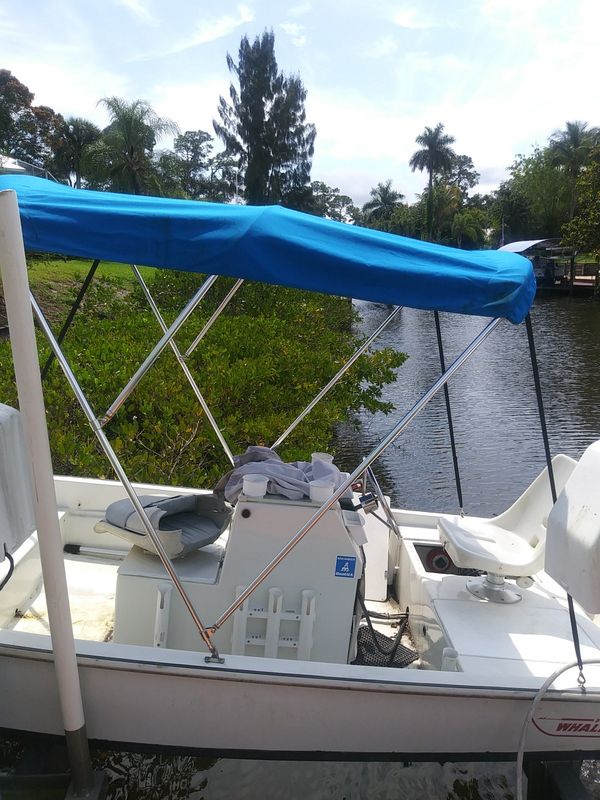 1969 Boston Whaler 13 foot new 25 horsepower Mercury engine new Bimini