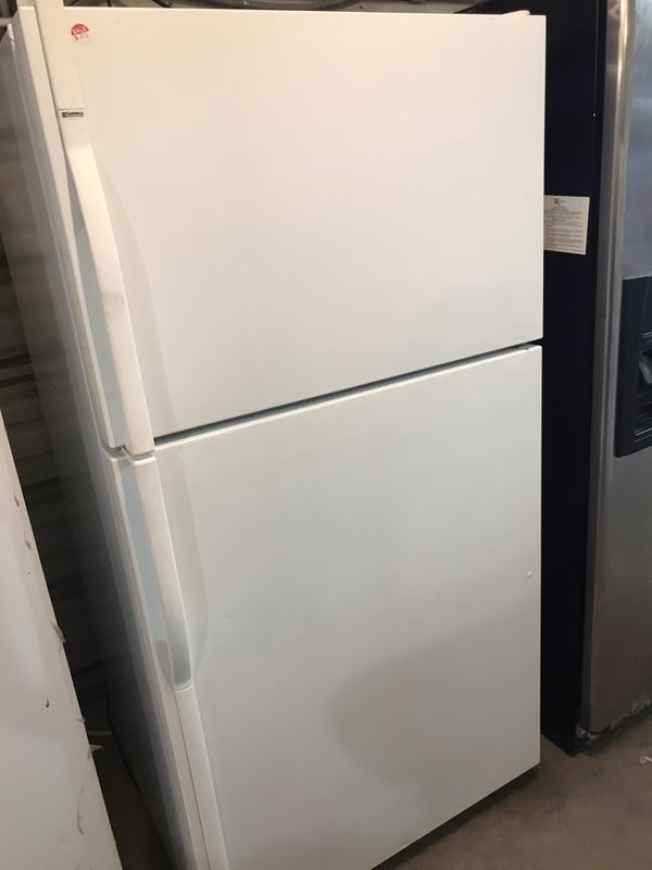 Kenmore refrigerator white color top freezer bottom refrigerator with a
