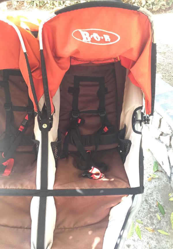 Bob Double Jogging Stroller Orange Good Condition for Sale in Santa Ana