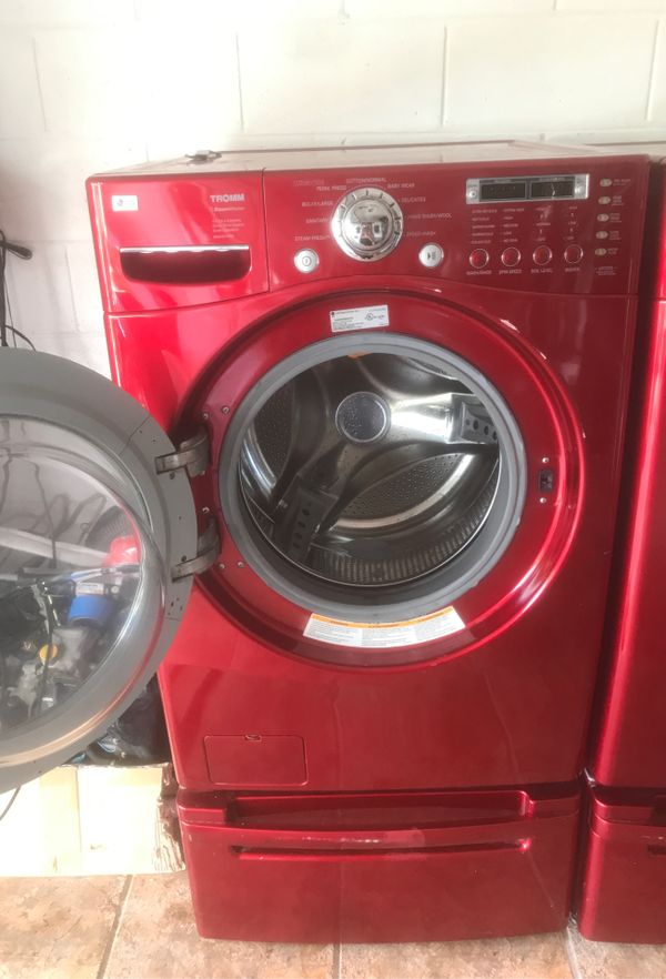 LG red washer and dryer set on pedestal for Sale in Kissimmee, FL OfferUp