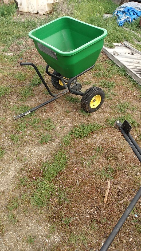 John Deere pull behind sweeper and fertilizer spreader for Sale in