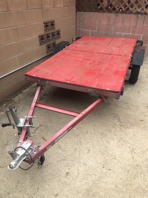 2012 Haul Master Heavy Duty 4X8 Folding Utility Trailer for Sale in Los