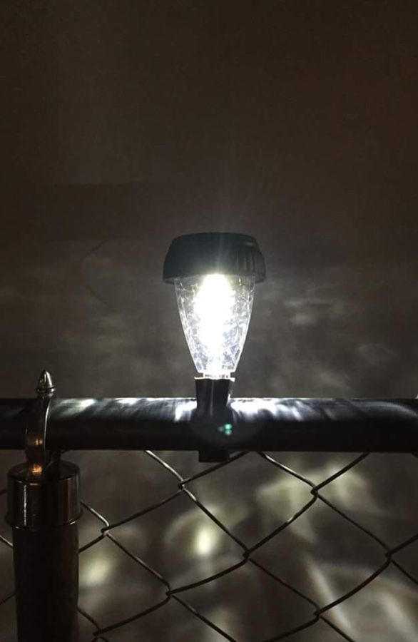 Solar lights for chain link fence. Easy one step click on top rail of
