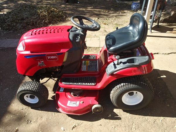 Practically New Toro LX-420 Riding Mower. Runs perfect. 74 hours total