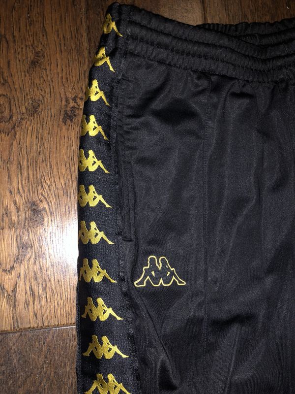 kappa pants black and gold