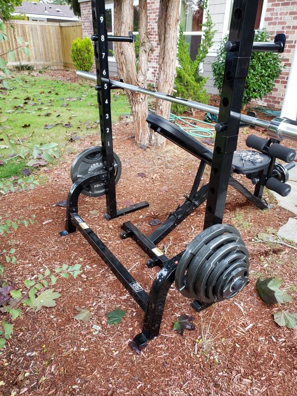 Marcy Pro adjustable weight Bench with squat stand and 300lb Olympic