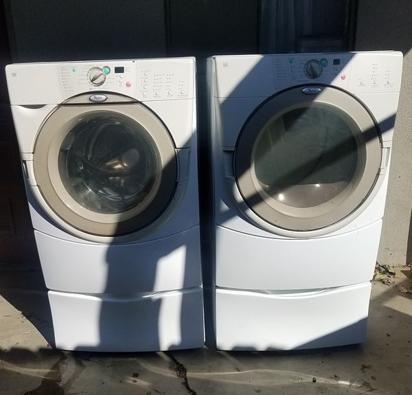 whirlpool duet washer and dryer set with pedestals for Sale in Woodland