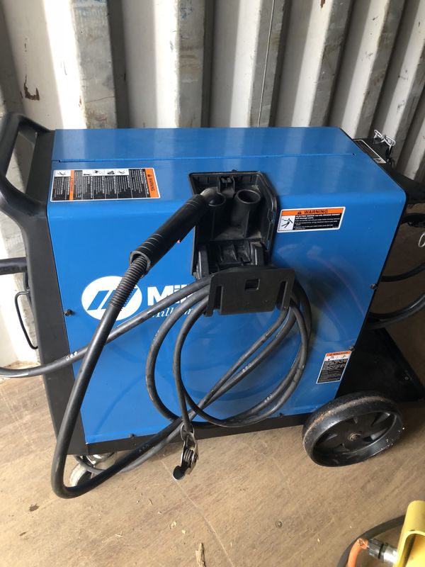 Miller Millermatic 210 MiG welder like new and brand new 3035 spoolgun