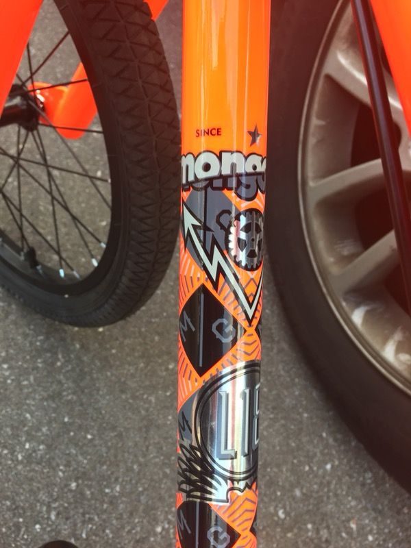 Boys Mongoose Legion L18 BMX Bike Barely Used Neon Orange for Sale in