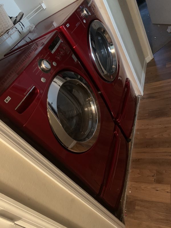 Red LG front load Washer and Dryer set w/pedestals for Sale in Daytona