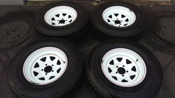 15 inch tires on white spoke wheels Jeep Ford very nice for Sale in ...