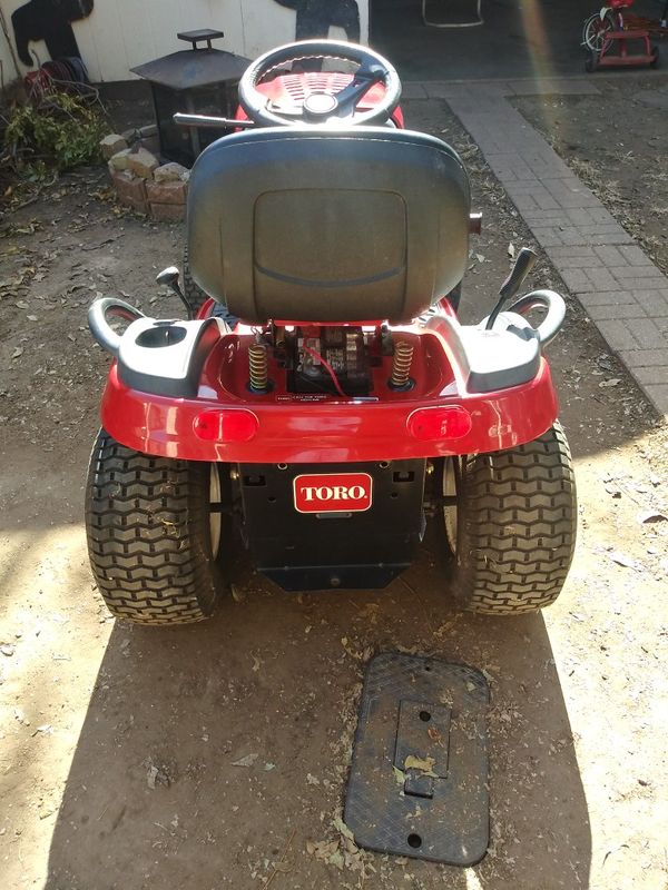 Practically New Toro LX-420 Riding Mower. Runs perfect. 74 hours total