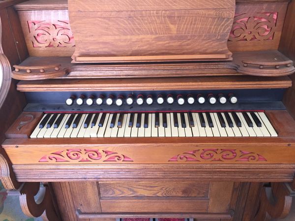 Antique light oak pump organ in good condition for Sale in