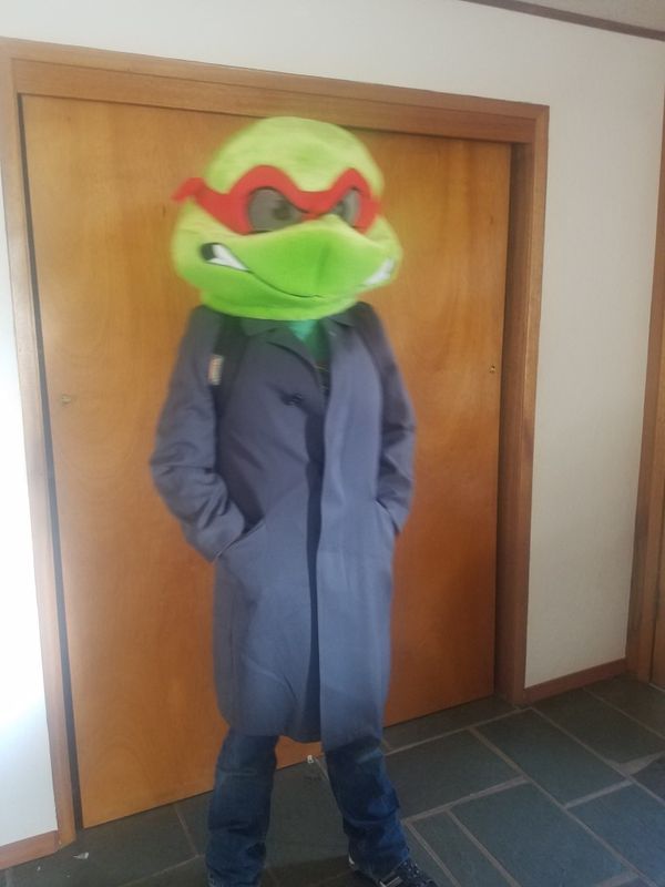 raphael in a trench coat