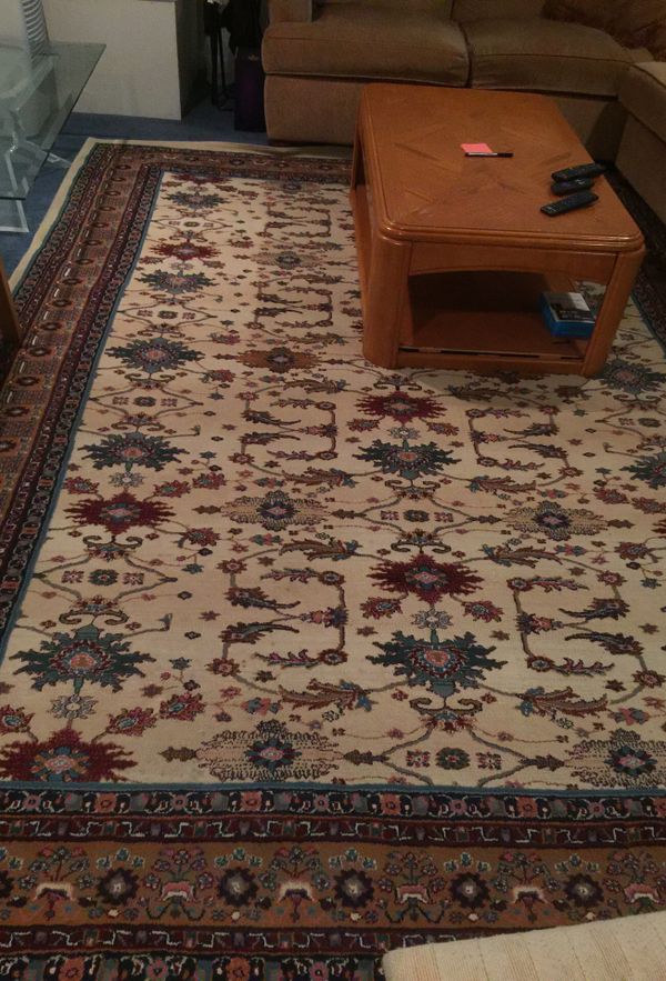 Area rug 10x12 very good condition like new and table 50 each for Sale in Troy, MI OfferUp