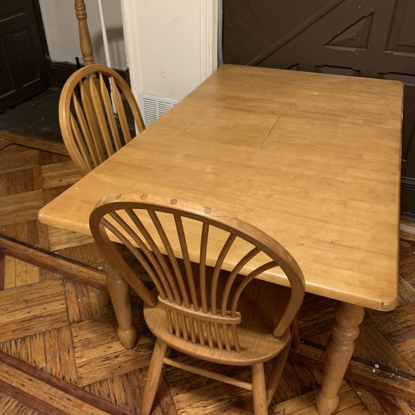Like new kitchen table wood, made in Malaysia. With chairs. for Sale in