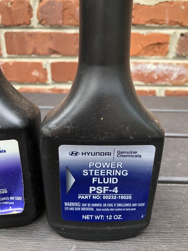 Hyundai power steering fluid PSF4part No. 0023219020 1 new unopened 12oz bottle & 1 half full