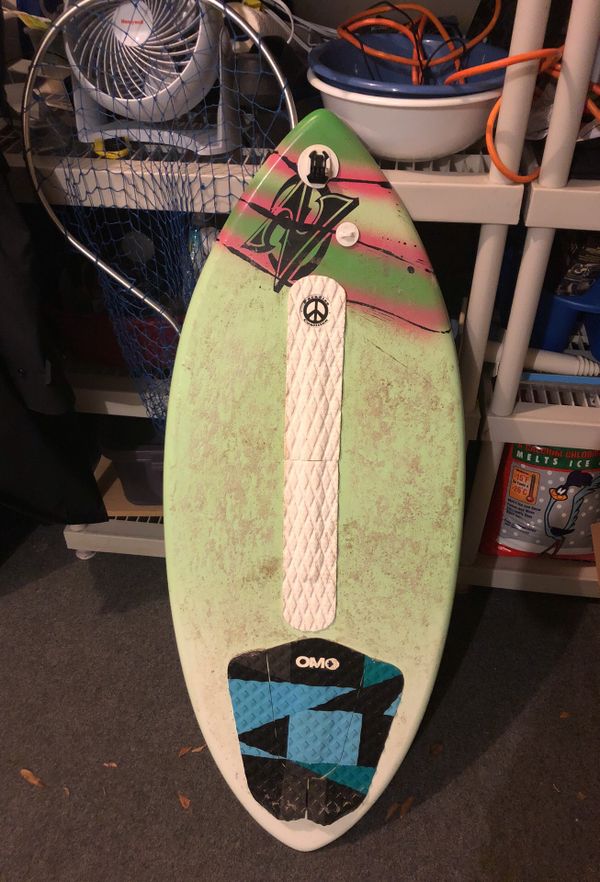 Zap skimboards, fiber class skimboard with traction pads and GoPro