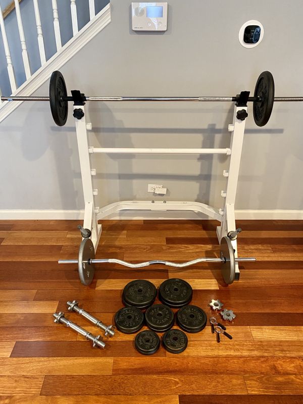 Standard weight set with bench/squat rack, ez curl and dumbbell bars