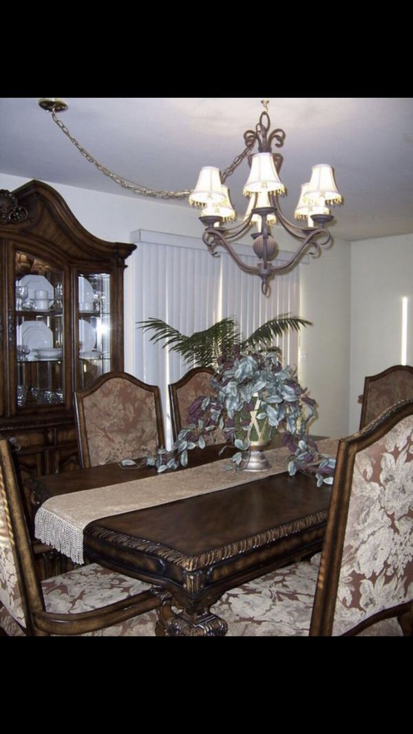 Ashley Casa Mollino Dining Table, 2 leaf, 8 chairs, and china cabinet