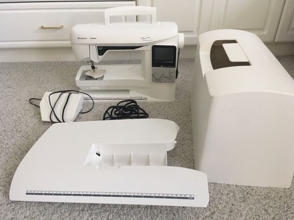 Husqvarna Viking Opal 690 sewing machine. Like new condition, plus an