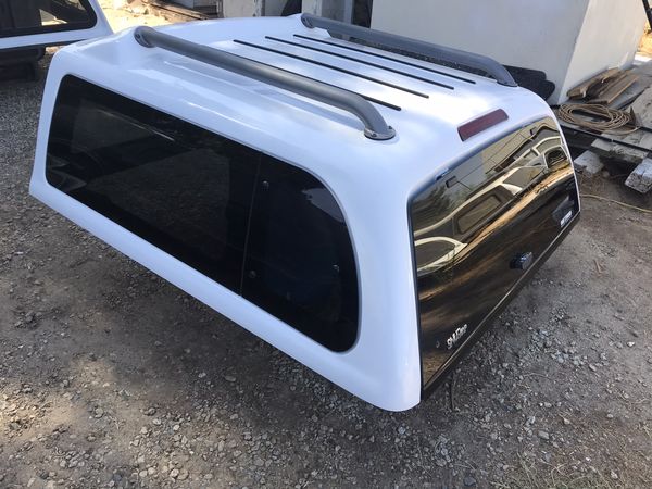 SnugTop Toyota Tacoma 5ft bed Camper shell for Sale in Perris, CA - OfferUp