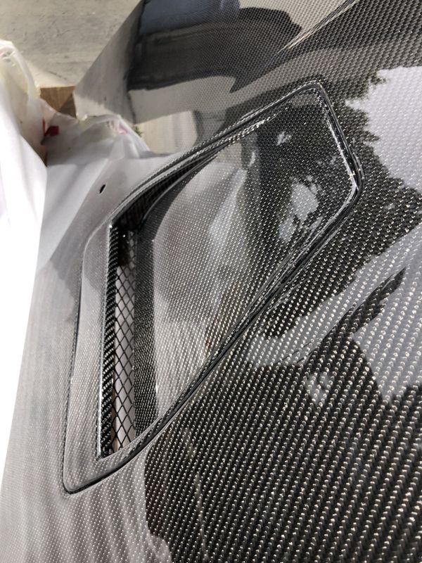 Seibon OEMSTYLE CARBON FIBER HOOD FOR 20082015 MITSUBISHI LANCER EVO