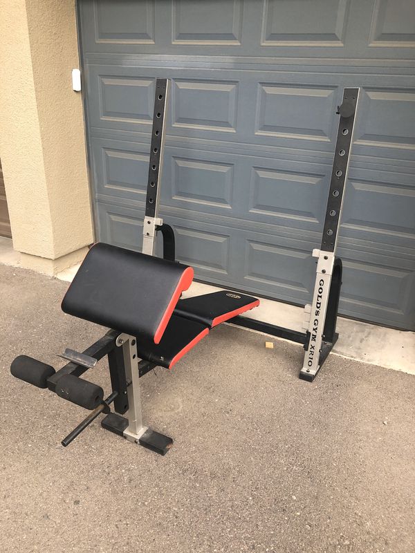 GOLDS GYM XR 10 OLYMPIC WEIGHT BENCH W/ WEIGHTS STORAGE for Sale in ...