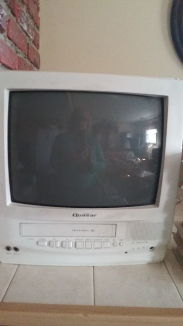 Quasar tv...vcr. Works great! Comes with 8 Disney movies for Sale in