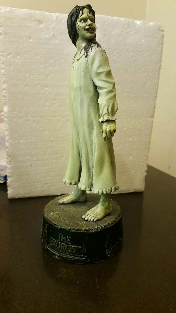 blue exorcist statue
