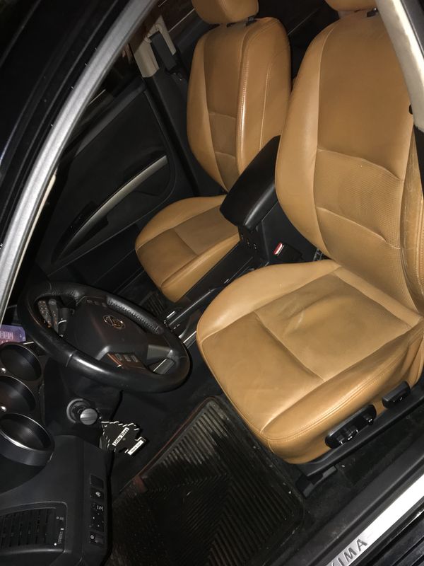 04 Nissan Maxima, rare peanut butter interior 220k miles, runs great well maintained and very