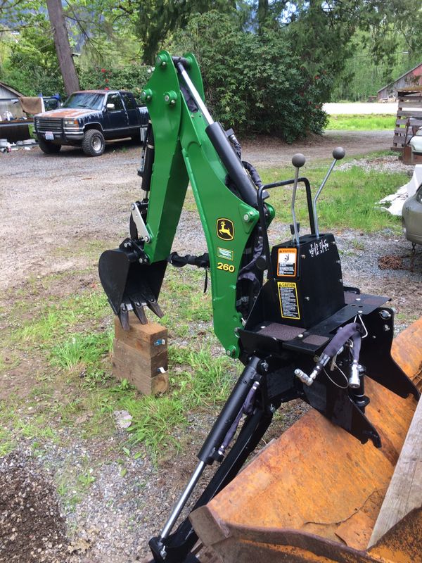 John Deere 260 Backhoe attachment! This is a new unit, has never broke