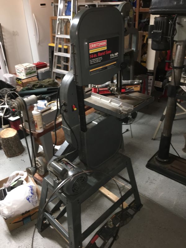 Craftsman Professional 14 in. band saw near new with stand and rollers