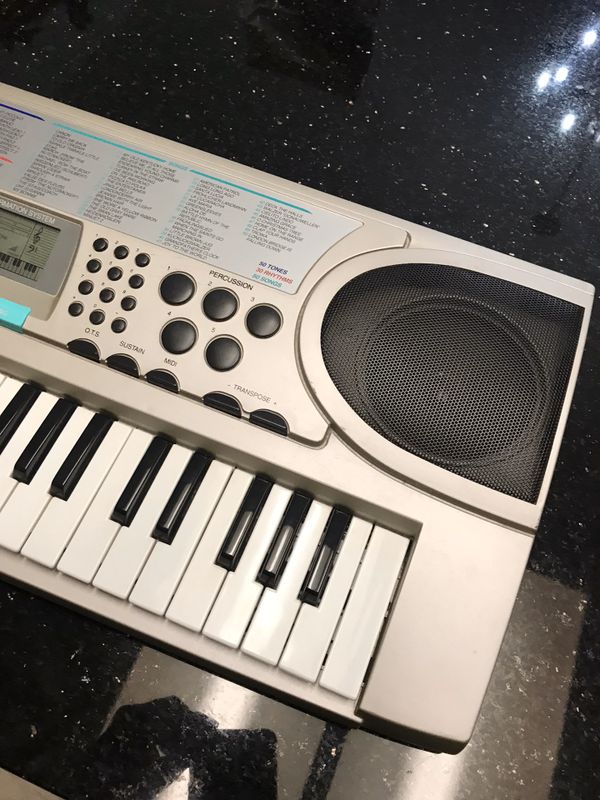 RADIO SHACK MIDI KEYBOARD MD501 WITH 49 MINI KEYS. Excellent working