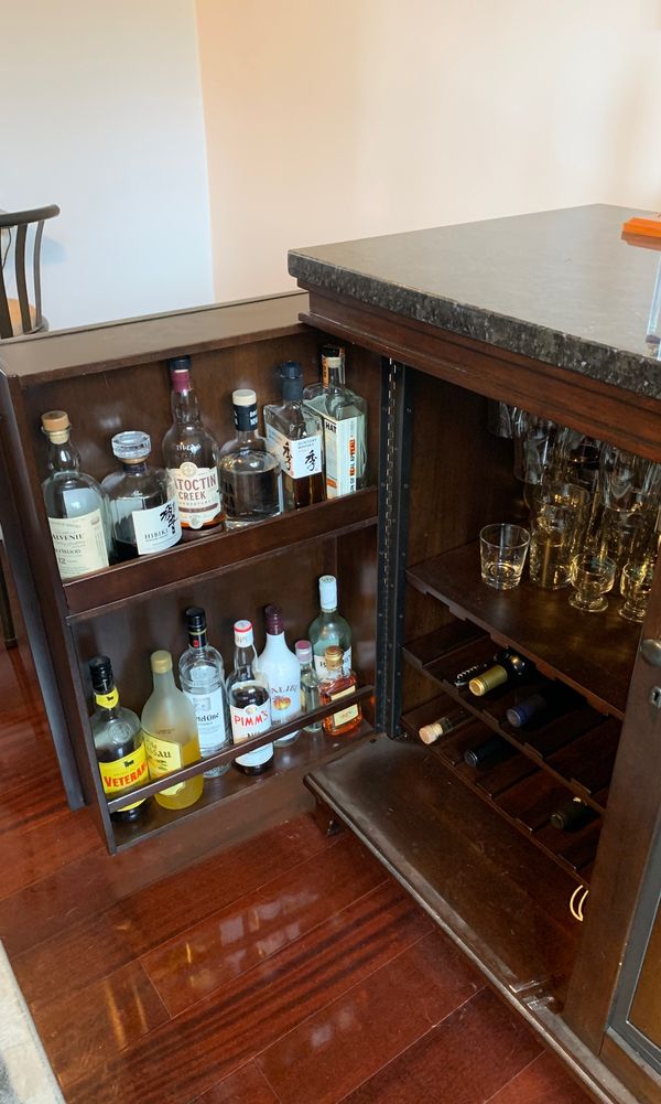 Liquor with built in beer/wine fridge for Sale in Washington