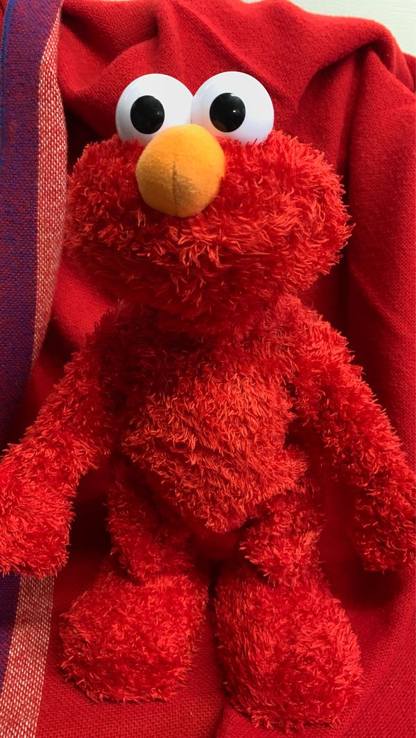 kaws doll elmo