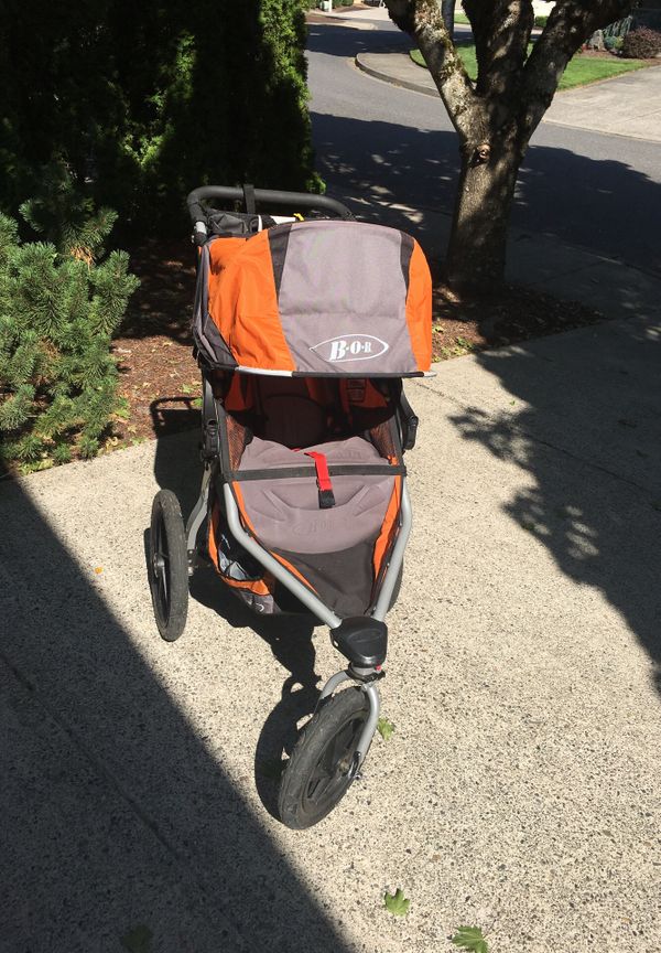 bob revolution se single stroller orange