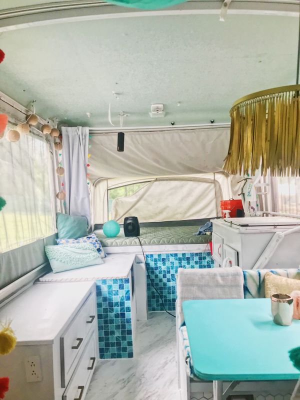 Coleman pop up camper trailer renovated interior glamper rv vacation on